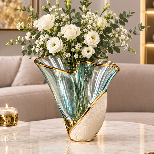 Sage green flared wave vase with cream textured panel and gold-toned trim, styled with white flowers.