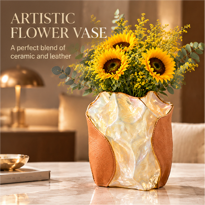 Ceramic and leather wave vase with sunflowers and artistic flower vase text.